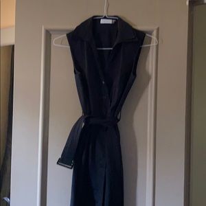 Black sleeveless shirt dress.